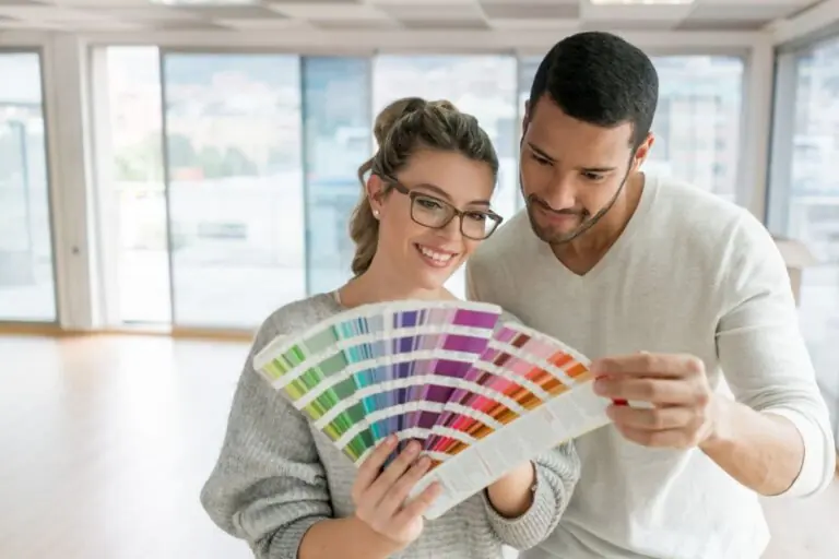 couple choosing the right paint for their home