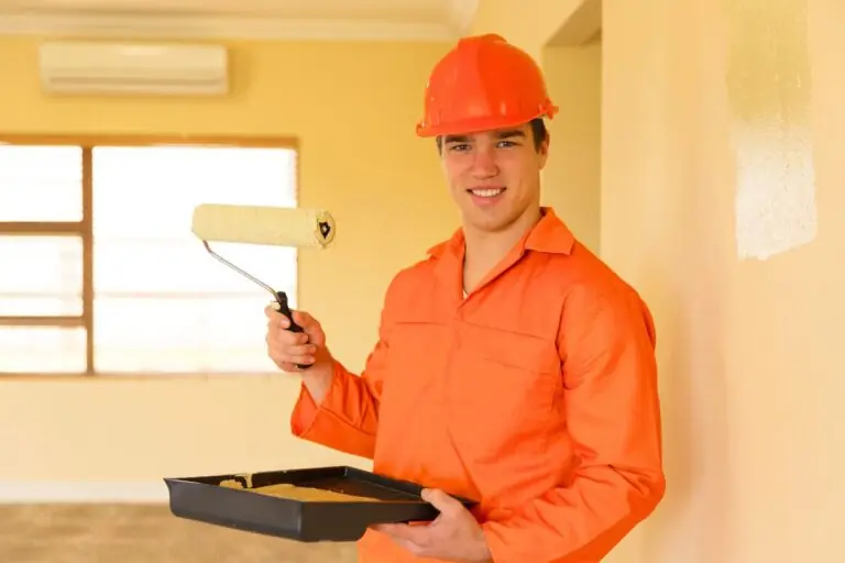 professional contractor enjoying painting