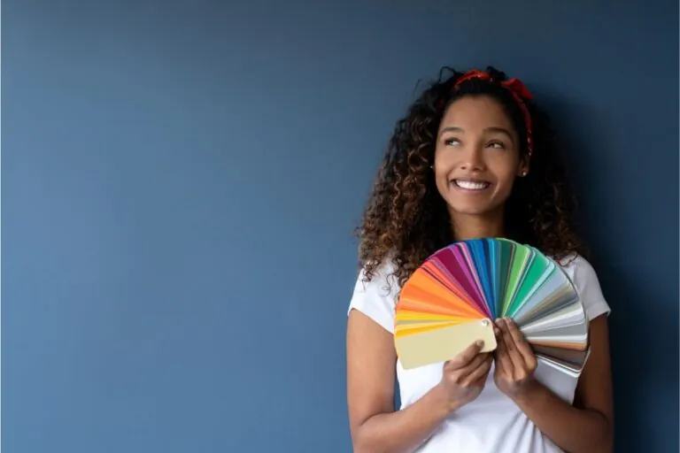 woman thinking about painting her house